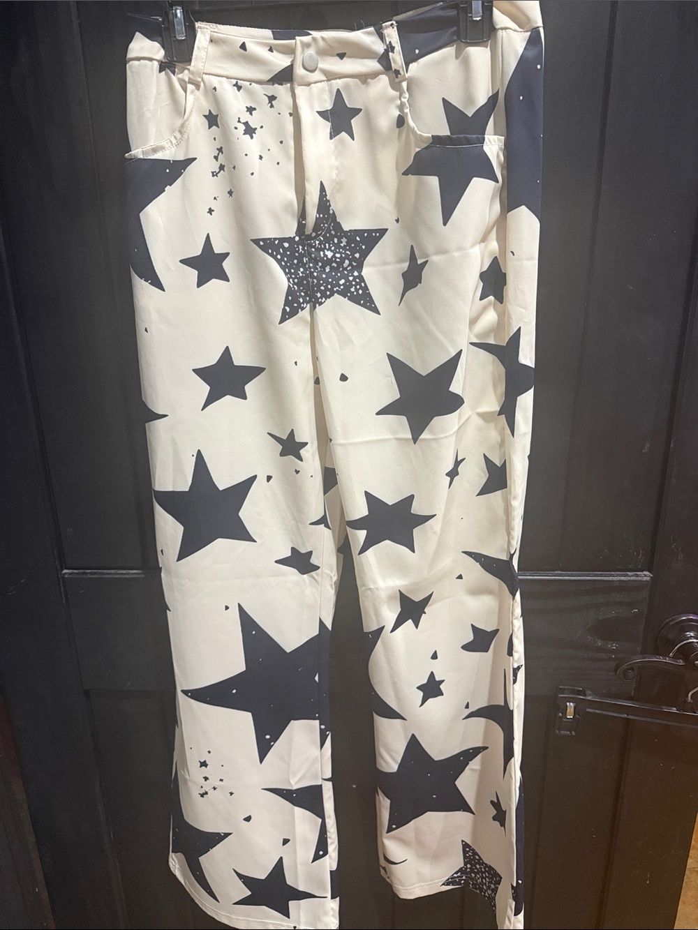 SHEIN Black Star Print Wide-Leg Pants on Cream